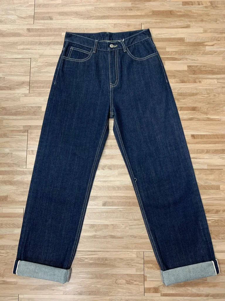 Complete front view of HB24905 indigo selvedge jeans, with both folded selvedge cuffs fully visible